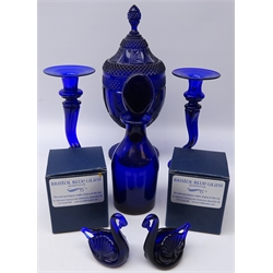  19th/ early 20th century pressed glass comport and cover, Bristol blue glass decanter, candlesticks and two Swan models (6)  