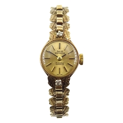  Mid 20th century 9ct gold bracelet wristwatch Swiss Empress set with two diamonds hallmarked   