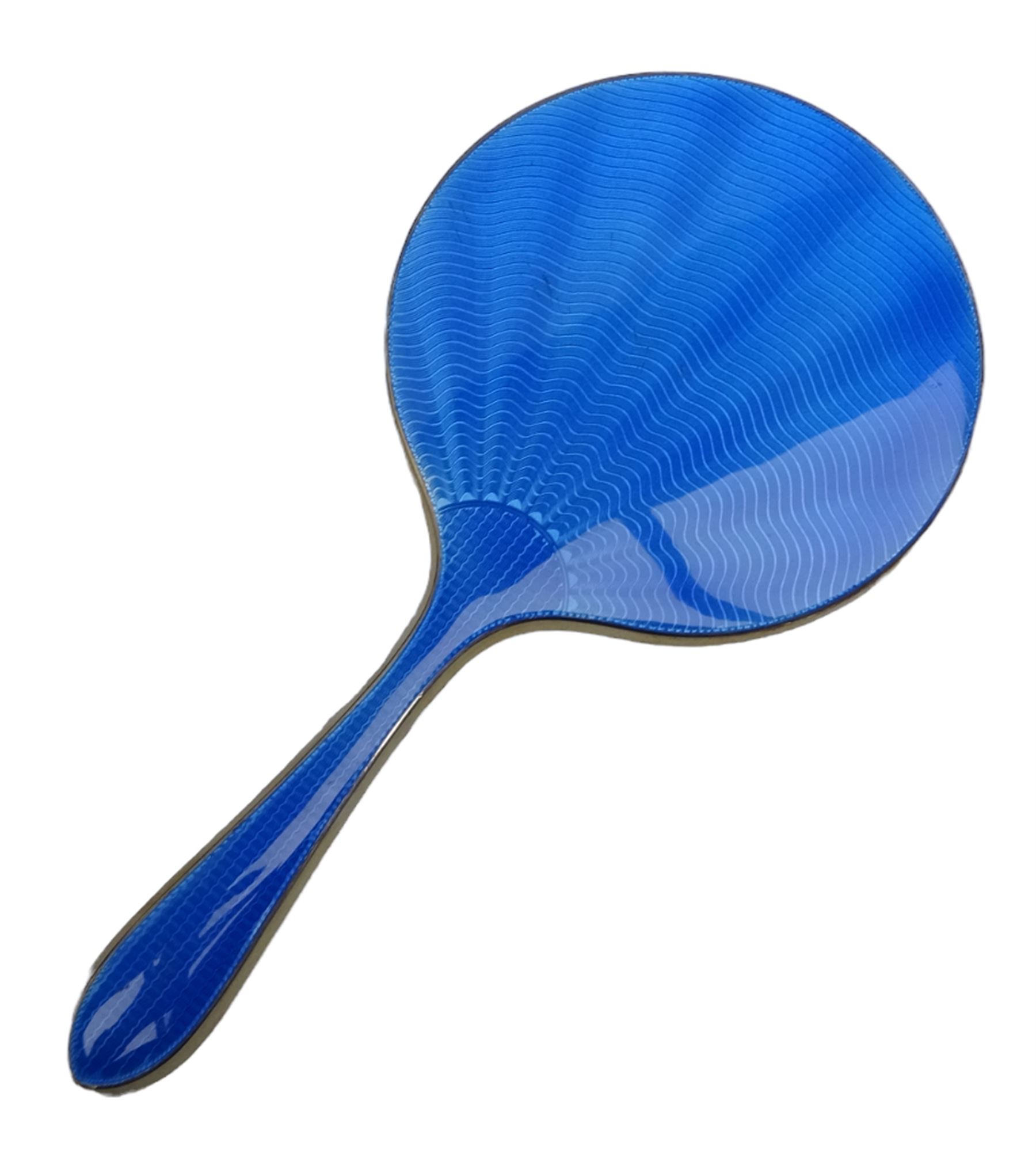 Art Deco thirteen piece silver mounted blue guilloche enamel dressing table set, comprising two hair brushes, two clothes brushes, hand mirror, two cut glass jars, buffer and a cut glass scent bottle, hallmarked J W Tiptaft & Son Ltd, Birmingham 1930 and 1932, and a silver handled manicure set, hallmarked Daniel Manufacturing Company, Birmingham 1930, with a pair of base metal scissors, each contained within three original fitted cases with black and cream silk and velvet lined interiors, one with removable mirror