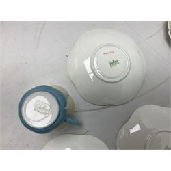 Shelley Dainty pattern tea wares, of lobed form with blue star decoration on merging white and yellow ground, comprising five teacups, five saucers, six tea plates, milk jug and cake plate, all with printed green mark beneath, some with painted pattern no 11770