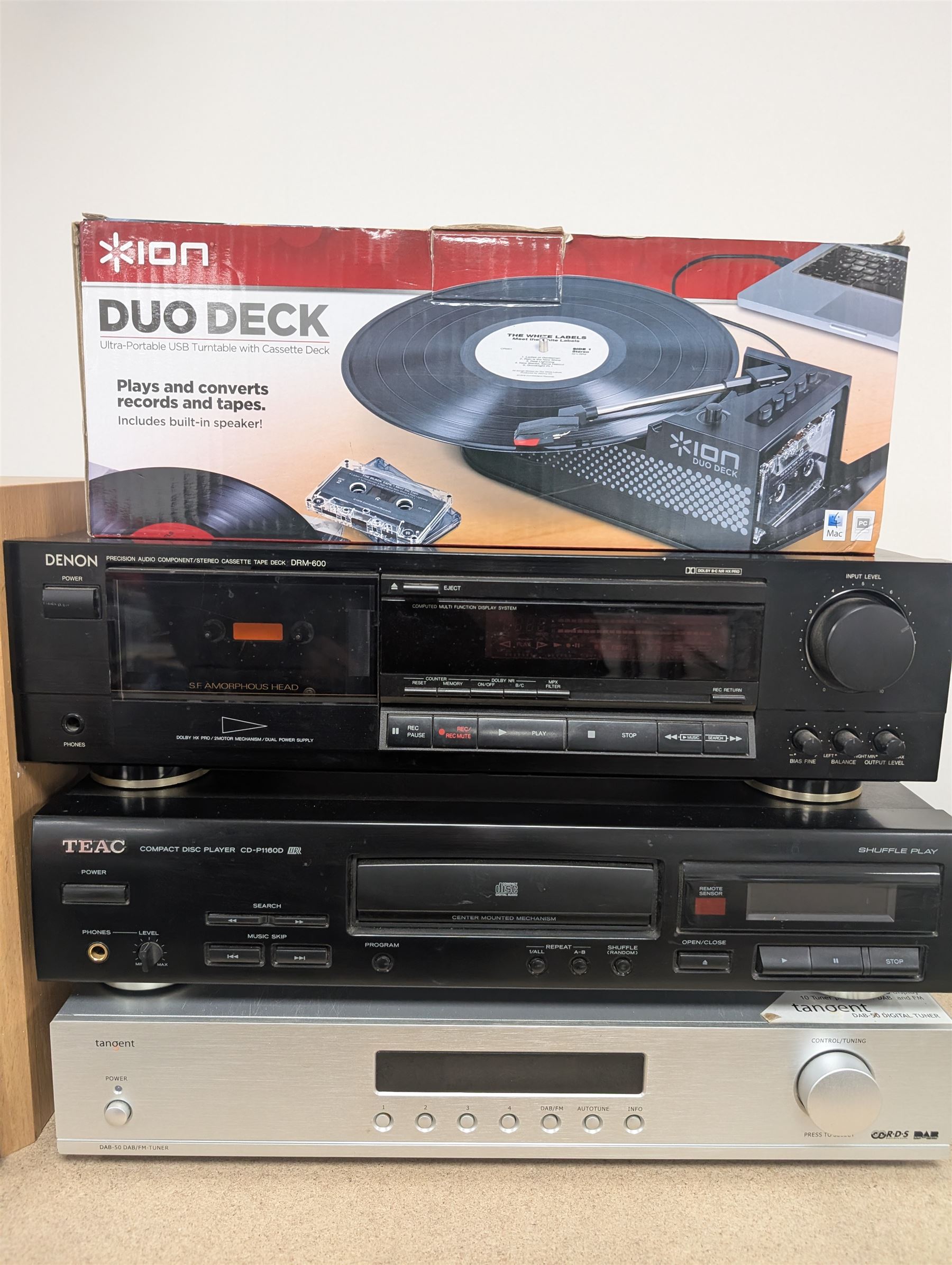 Collection of audio equipment, including Cambridge Audio Integrated Amplifier, two Panasonic speakers, ION Duodeck turntable, Denon DRM 600 tape deck, Teac P160D CD Player and a Tangent DAB radio