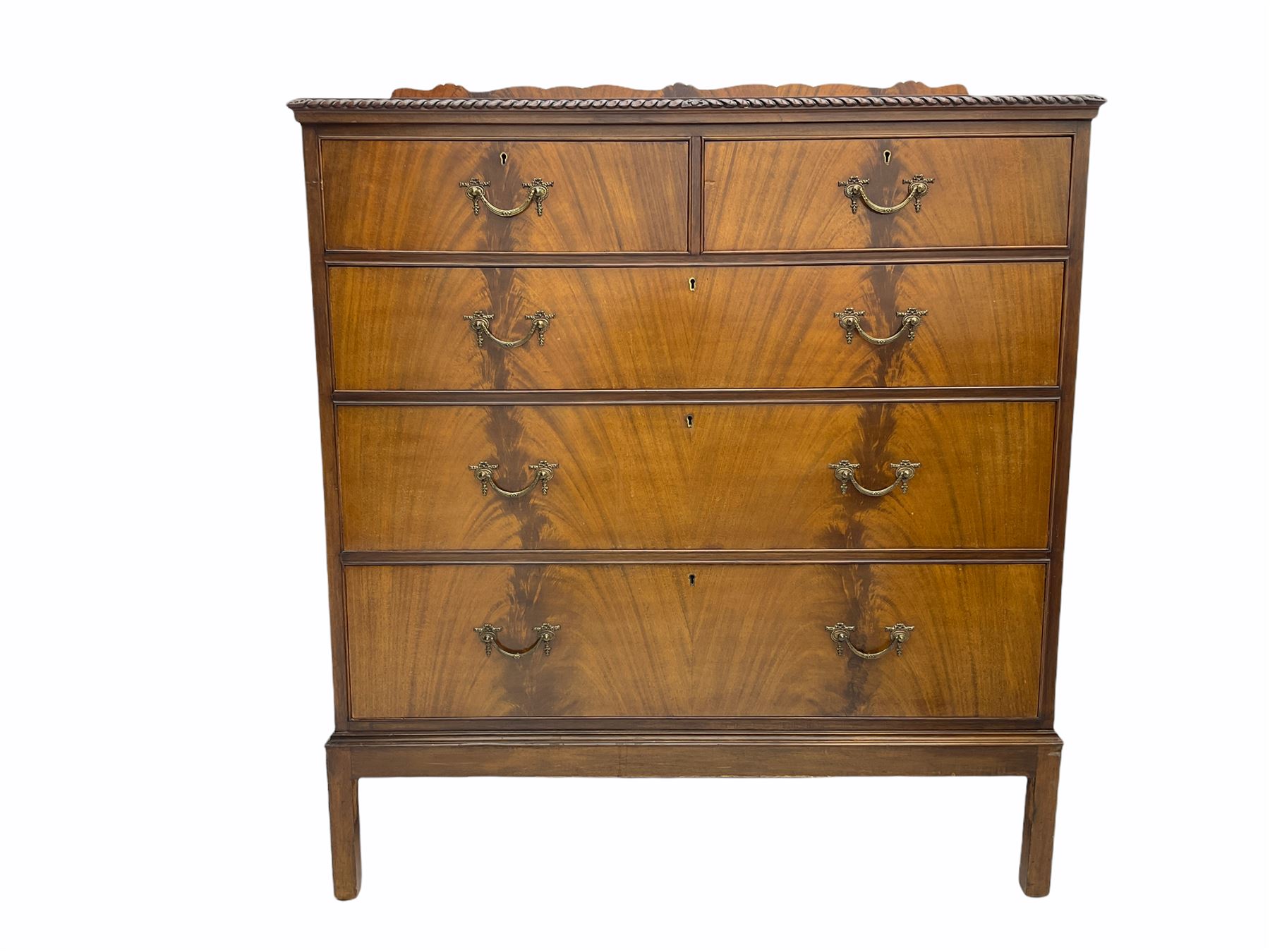 Early 20th century mahogany bedroom suite - dressing table (W122cm, H161cm, D56cm), chest (W107cm, H125cm, D51cm), and bedside cupboard (W44cm, H80cm, D44cm)