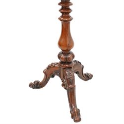 Victorian rosewood pole screen, shaped and shell carved frame enclosed needlework panel, on turned pedestal with three floral carved splayed supports with scrolled foliate terminals 