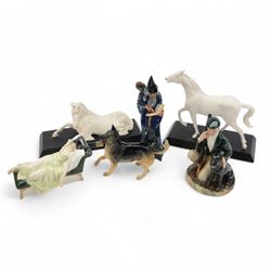 Five Royal Doulton figures, including Gamekeep HN2879, Sleeping Beauty HN3079, The Wizard HN2877 etc, together with two Beswick figures 