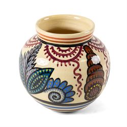 Paul Fouillen for Quimper pottery, decorated with stylised flowers, in blue and purple ton...