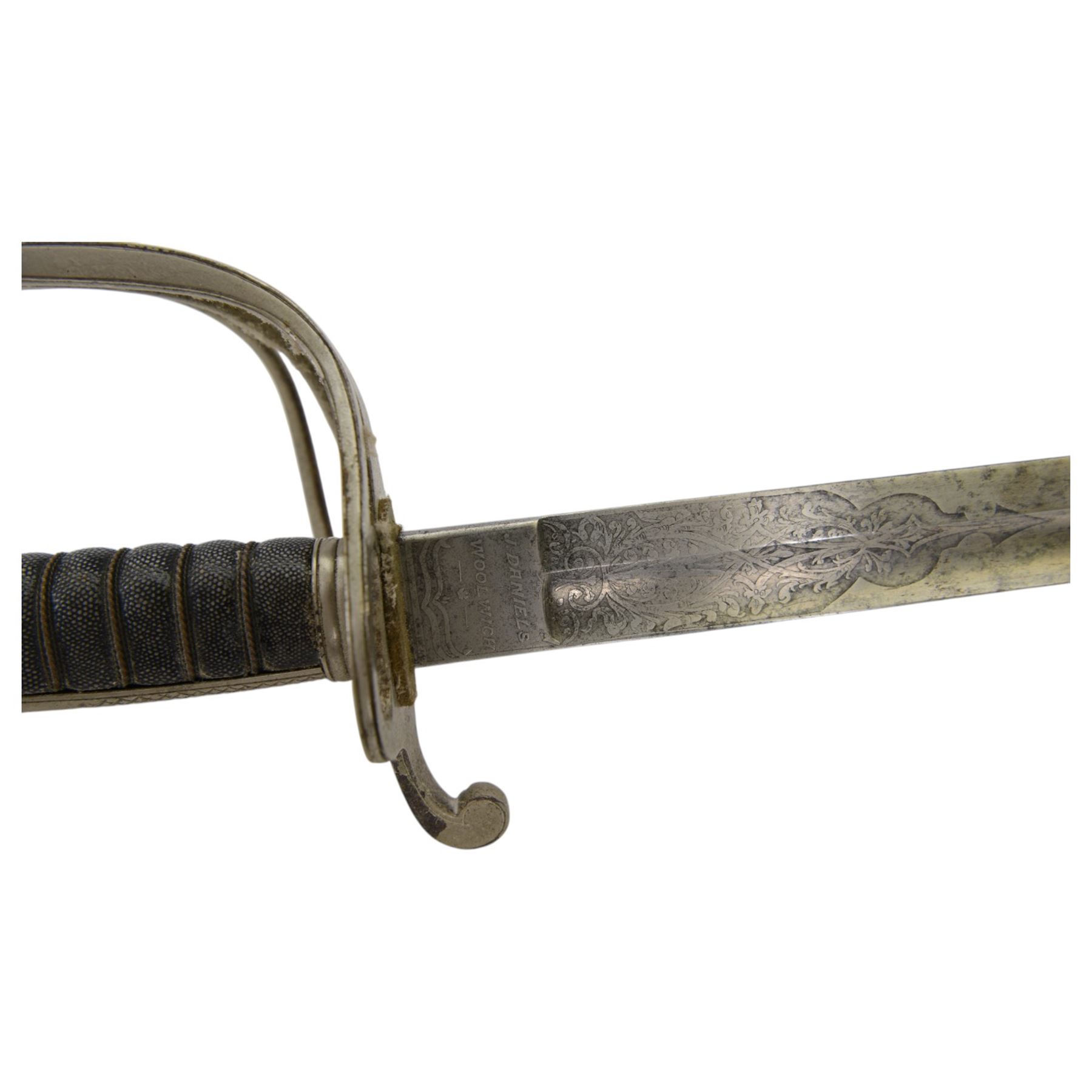 British Artillery Officer's sword by J. Daniels & Co, Artillery Place Woolwich, the 88cm steel blade engraved Durham R.G.A (H.E), wirebound fishskin grip, chequered backstrap and stepped domed pommel, in brown leather scabbard, overall L104cm