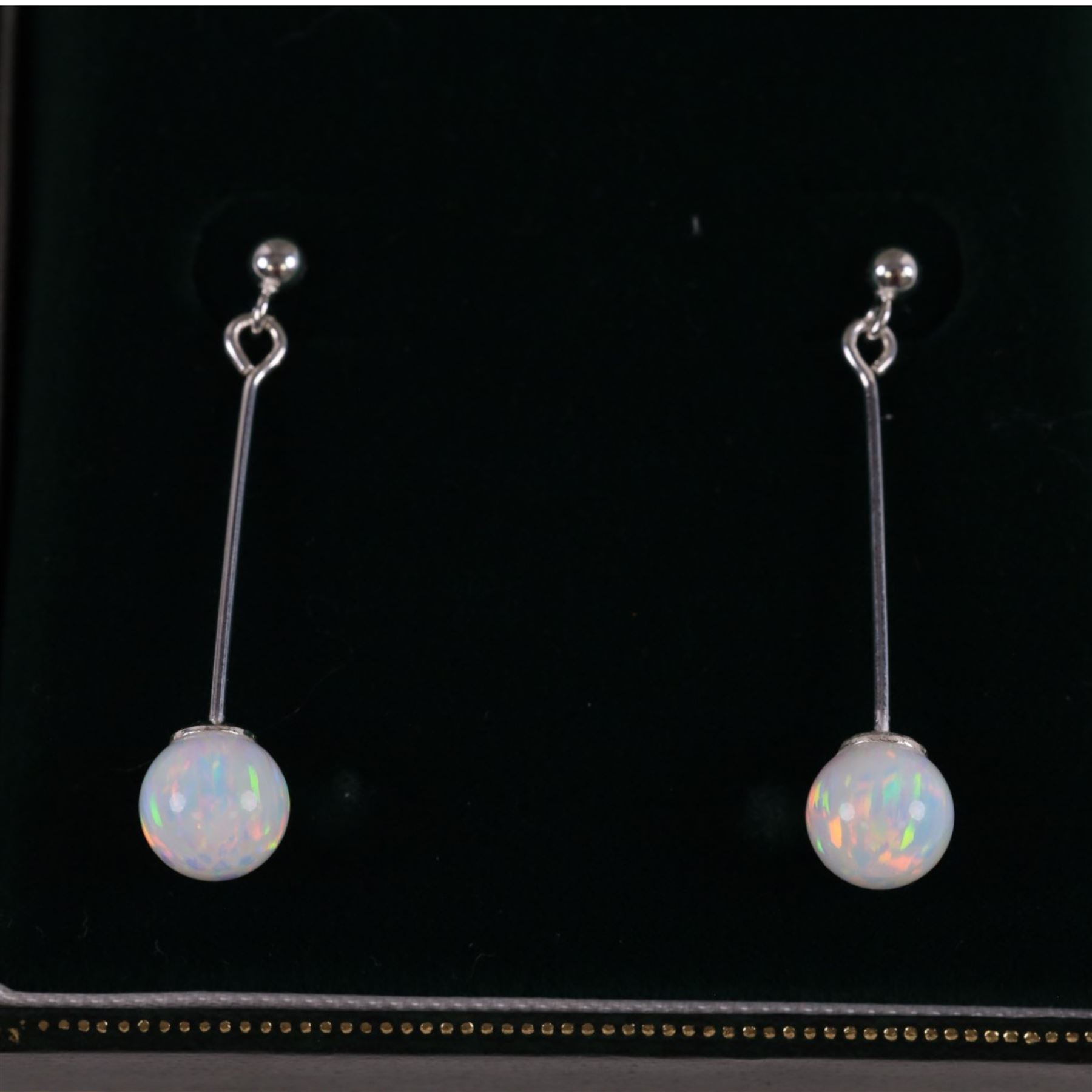 Pair of silver opal pendant stud earrings, boxed