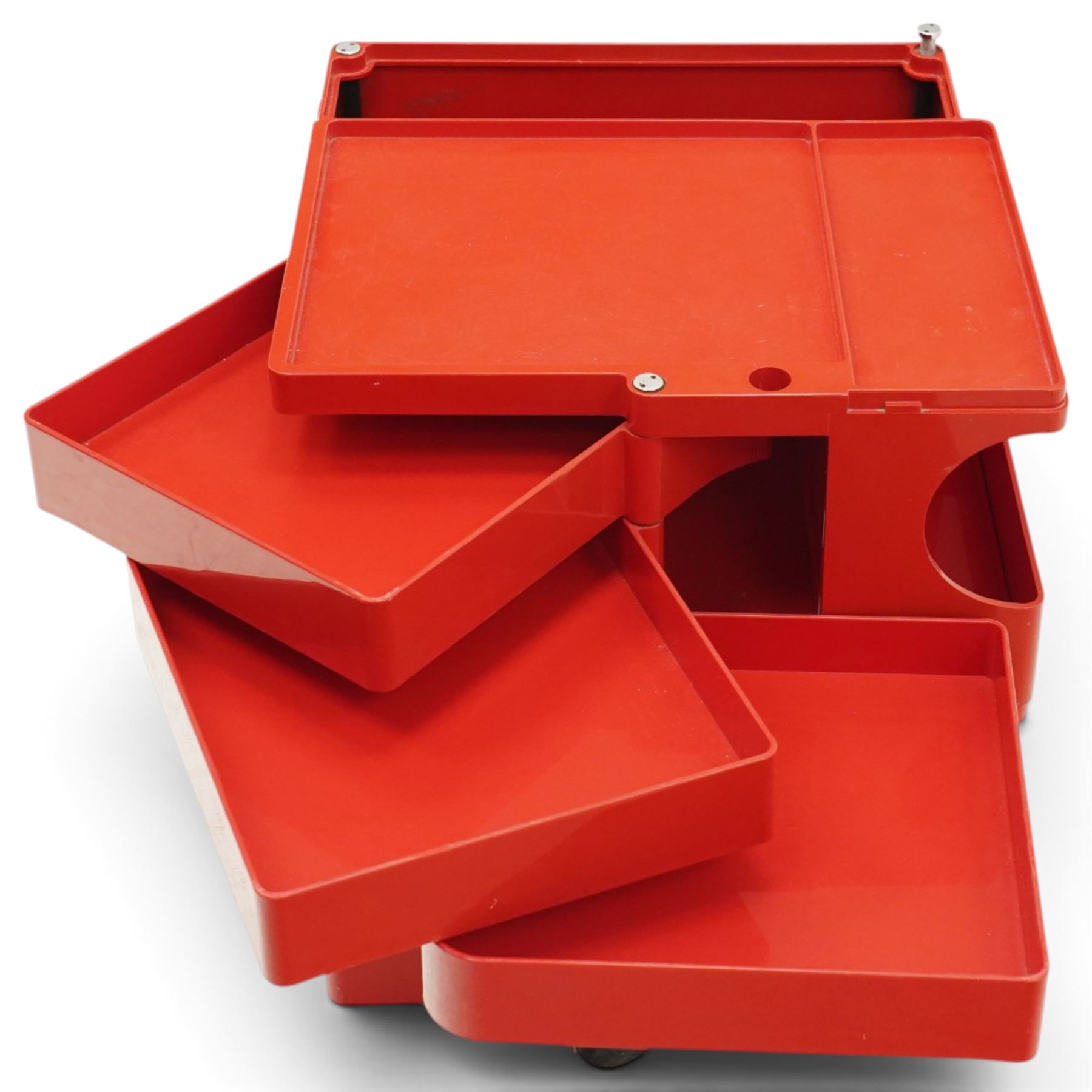 Joe Colombo (Italian 1930-1971) for Bieffeplast - 'Boby' red trolley circa 1970s, rectangular tray top above three pivoting drawers, open storage compartments raised on castors