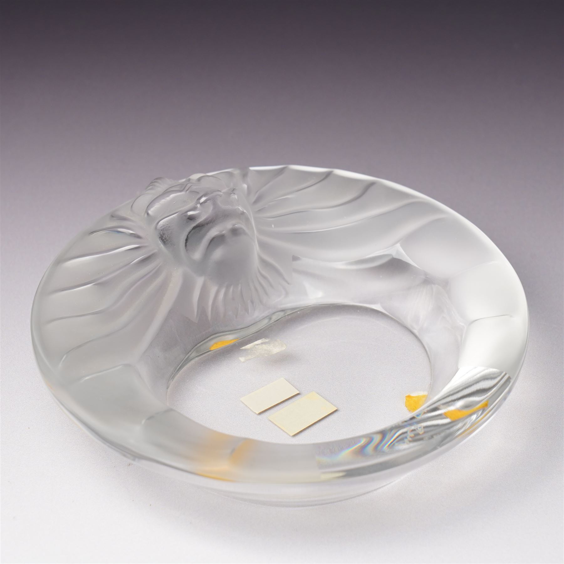 Lalique Lions Head glass ashtray and an 'Anemone' flower, both marked Lalique, France and boxed (2)