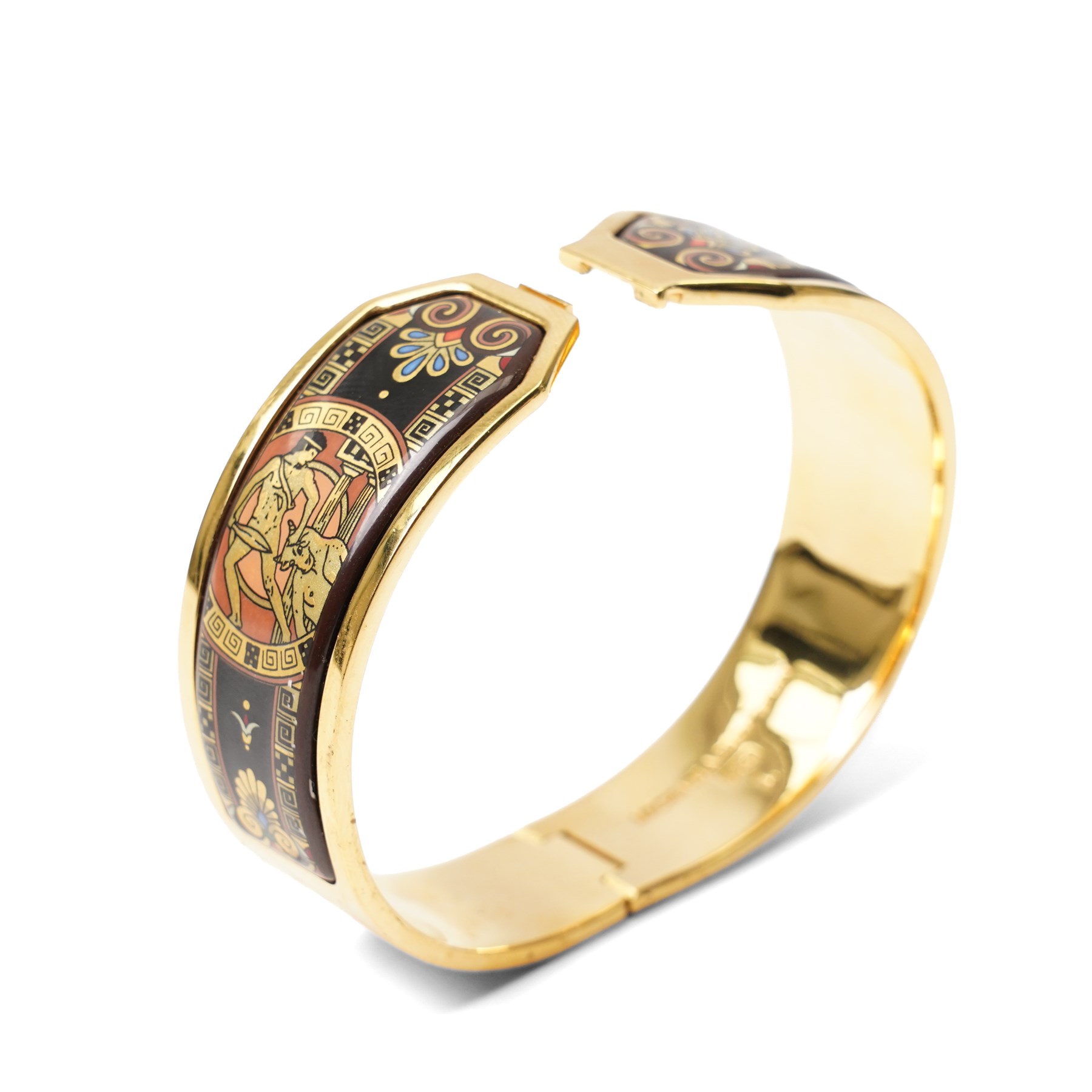 Michaela Frey gold plated and enamel suite of jewellery from the Greco-Roman collection, including a pair of oval stud earrings, hinged bangle and pendant on multistrand rope necklace, all boxed