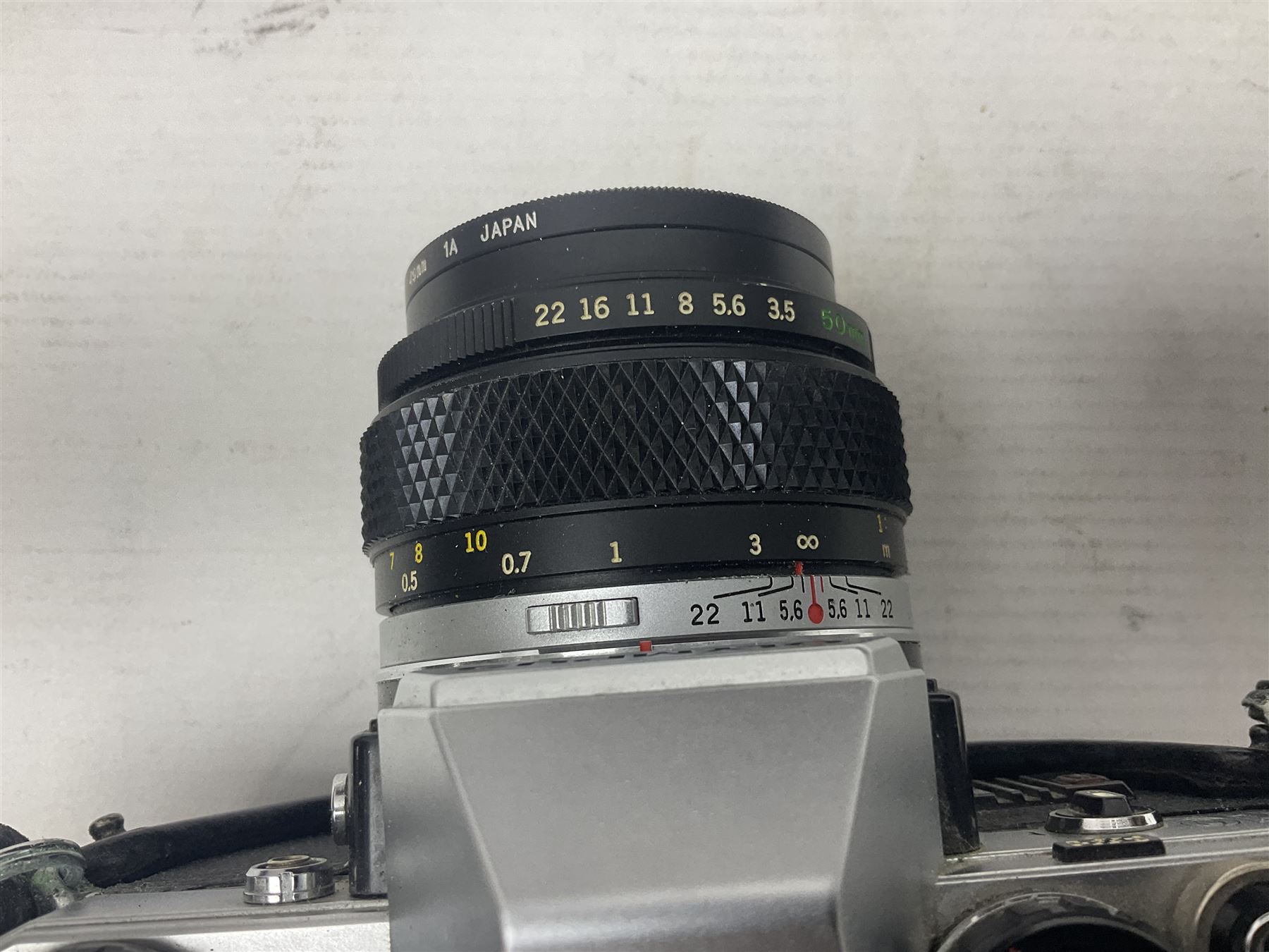 Olympus OM-2 camera body, serial no 1117526, with Olympus OM-System Zuiko Auto-W 28mm 1:2.8'  lens serial no 336591, Olympus OM10 camera body serial no 2392257, with Olympus OM-System Zuiko Auto-Macro 50mm 1:3.5' lens serial no 225784, Soligor C/D mirror lens 1:8 f=500mm' serial no 784035650 together with other camera equipment 