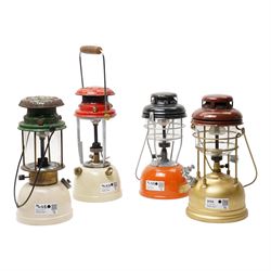 Bialaddin paraffin pressure lamp Model 300, two Tilley pressure lamps and one other pressure lamp