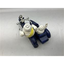 Cast iron figure of Michelin Man on motorbike modelled with smaller seated Michelin man in sidecar, H16cm