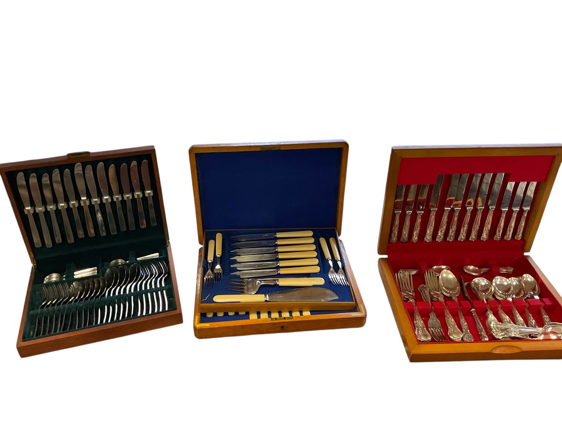 Three cased canteens of cutlery, including a set of fish knives 