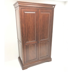  French cherry wood double wardrobe, projecting cornice, two doors enclosing single shelf and hanging rail, shaped plinth base, W118cm, H198cm, D64cm  