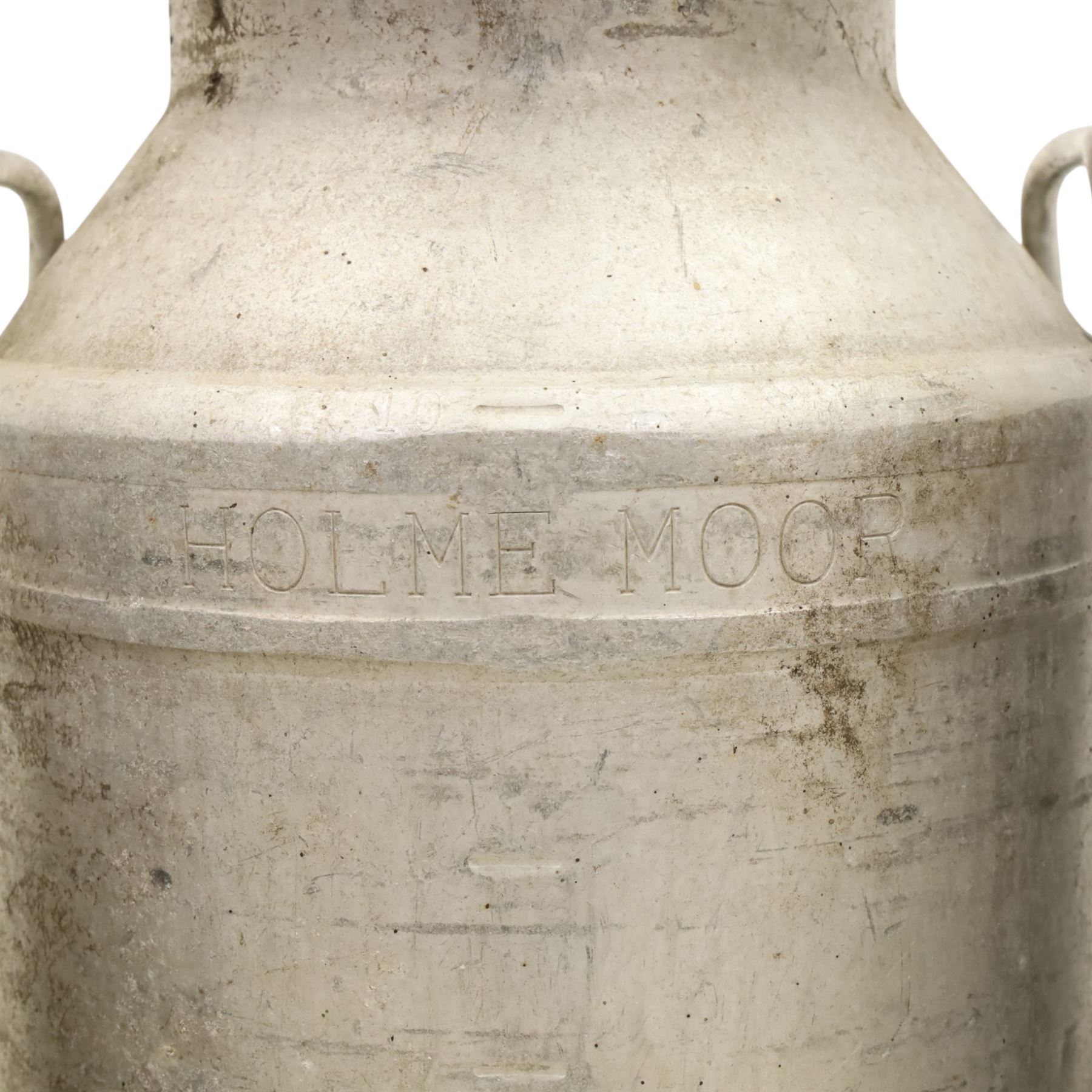 20th century aluminium set of three milk churns, with handles, baring the stamps of 'Middlesborough Co-op', 'Holme Moor', 'Wholesale Dairies' 