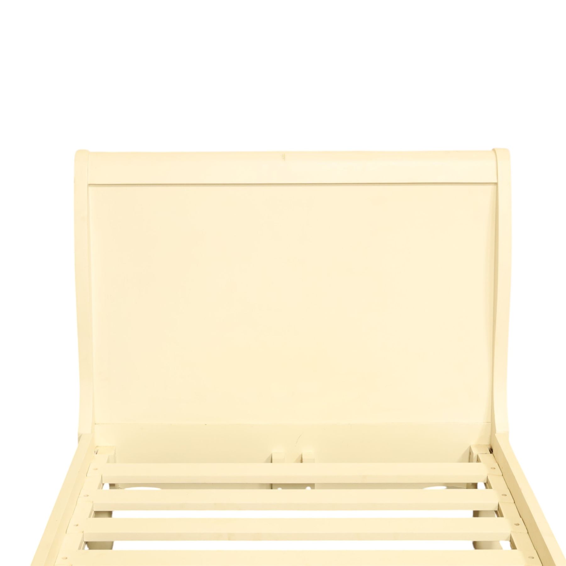 Modern white painted single sleigh bed frame and mattress, with scrolled head and footboard with foliage detail