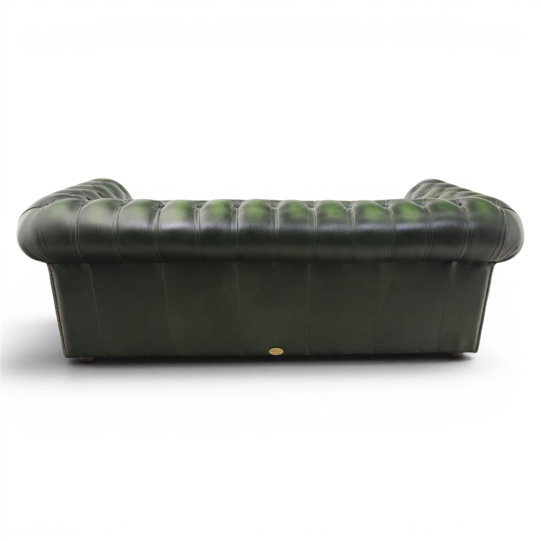Distinctive Chesterfields - Chesterfield two cushion sofa, upholstered in green deeply buttoned leather
