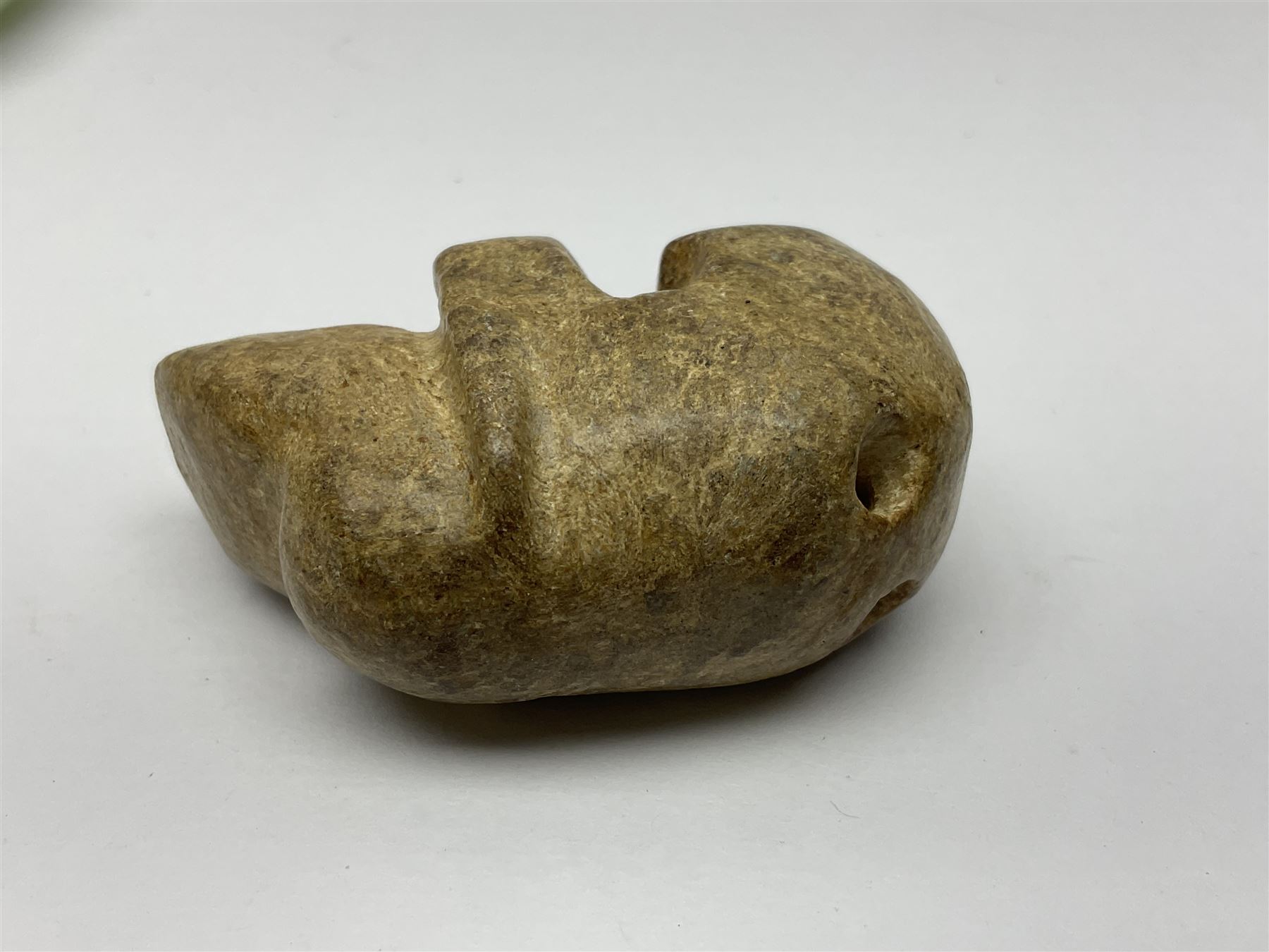 Chinese hardstone carving of a fish amongst coral, with platted rope handle, together with other hardstone and soft stone carvings  