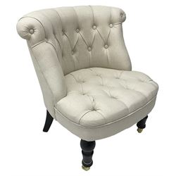 Eichholtz Furniture - bedroom chair with curved back upholstered in buttoned cream fabric, turned ebonised front supports with brass cups and castors