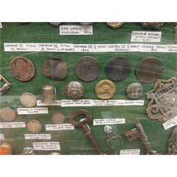 Collection of metal detecting finds and antiquities, housed on five display boards and some loose, to include coins, keys, axe head etc 