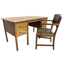 Mid-20th century teak office desk, fitted with four drawers; together with a similar period office desk chair 