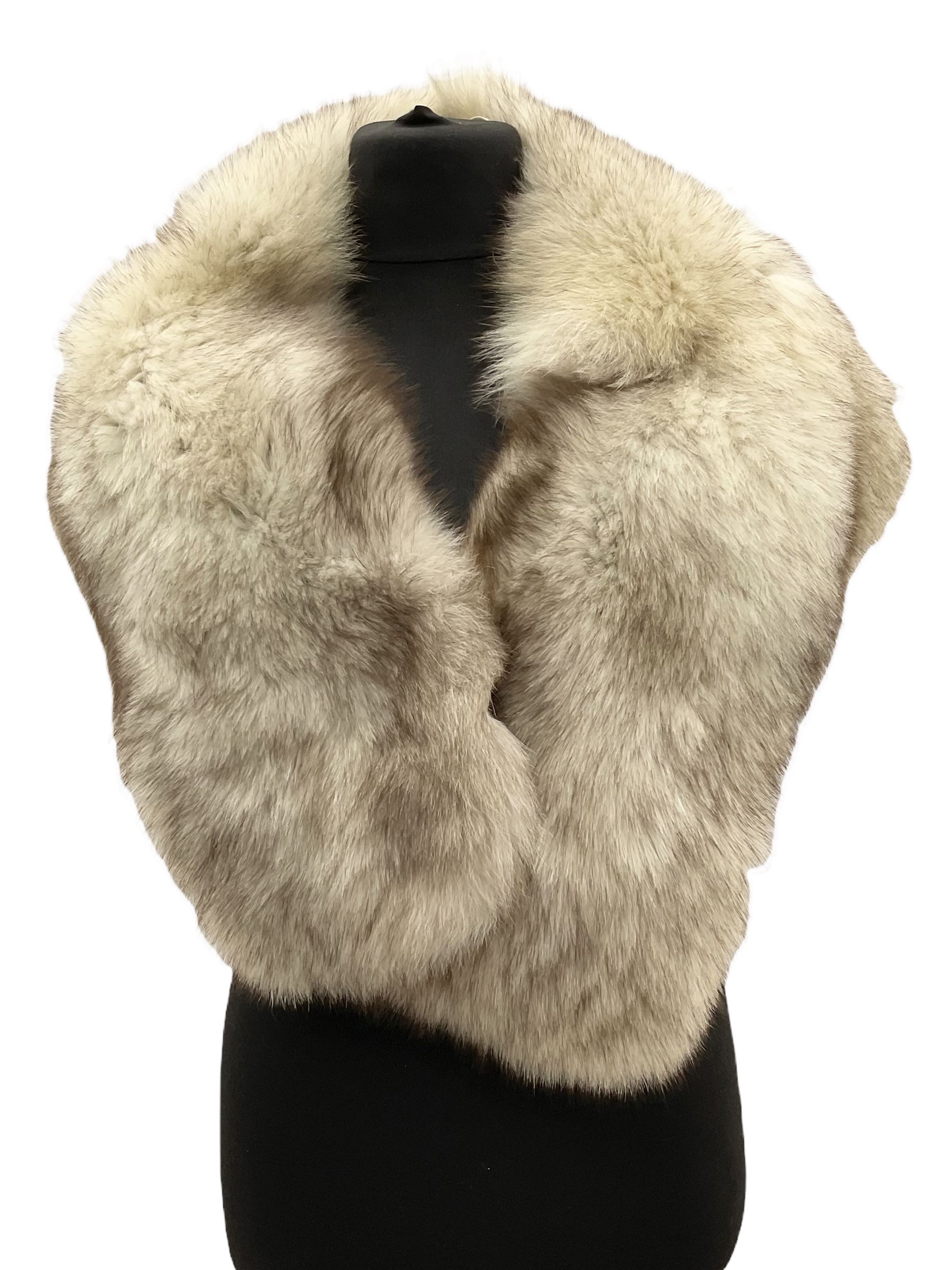 White Saga fox stole, together with Cresta Red fox fur hat, Red fox fur headband, a fur headband and matching cuffs, Harris Tweed clutch bag with fur trim, a fur clutch bag and an Ostrich feather and mohair scarf. 