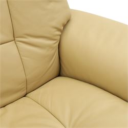 Ekornes Stressless - beech framed reclining two seater sofa, out-swept arms over tapering supports, upholstered in beige leather