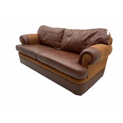 Peter Silk of Helmsley two seat sofa, upholstered in brown leather and fabric, feather back cushions, reversible cushion option