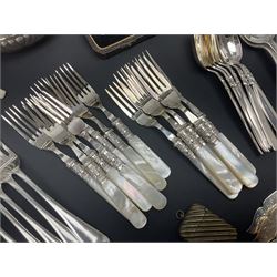 Mother of Pearl handled cutlery, with silver ferrules, comprising six fish knives and forks and six fruit knives and forks, the ferrules hallmarked Yates Brothers, Sheffield 1905, together with silver plated Edwardian three piece tea service and other flatware 