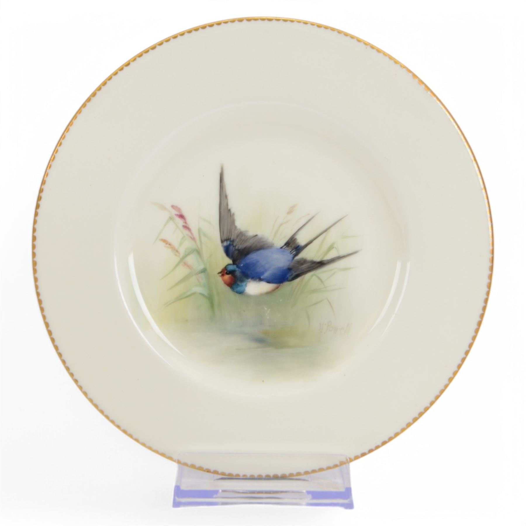 Four Royal Worcester hand painted ornithological plates, by W Powell, painted with a 'Chaffinch', 'Robin' 'Swallow' and 'Grasshopper Warbler', each named verso and bearing printed mark, D15cm 