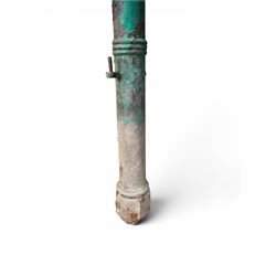 19th century circular cast iron gate post with finial, painted in distressed green finish