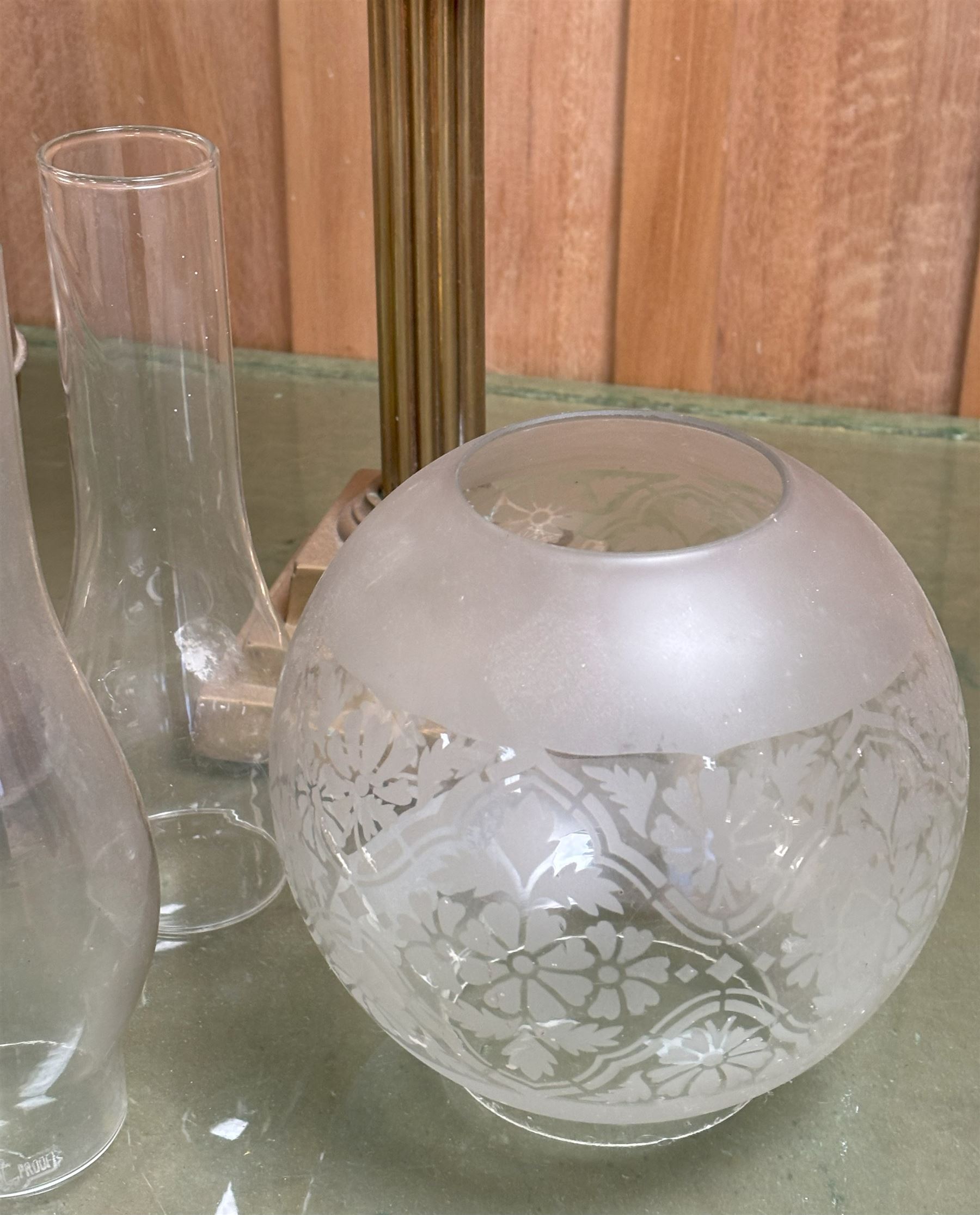 Edwardian columnar brass oil lamp (H73cm) together with another oil lamp, two etched glass globes and four glass flutes (8)  - COLLECTION BY APPOINTMENT FROM: The White House, Thirsk Road, Easingwold, York, YO61 3NF - CALL 01723 507111 TO ARRANGE
