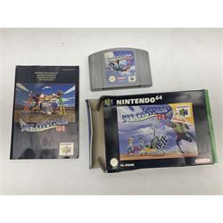 Nintendo 64 console, two controllers, games and accessories. Accessories to include the ‘Tremorpak’ and ‘Spook’ 2 Phono plugs and a S-VHS plug with adapter, both in original boxes. Games to include ‘Golden Eye 007’, ‘Doom 64’, ‘Killer Instinct Gold’, ‘Tetrisphere’, ‘F-1 World Grand Prix’, ‘Pilotwings 64’ and ‘Lylatwars’ with ‘Rumble Pak’, all with original boxes and instruction manuals. ‘Star Wars Episode I Racer’ game cartridge in Shadows of the Empire box. 