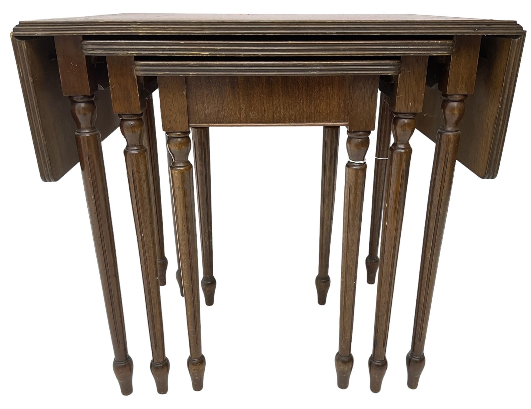 Mid20th century nest of three mahogany occasional tables, the largest