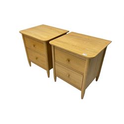 Pair light oak two drawer bedside chests