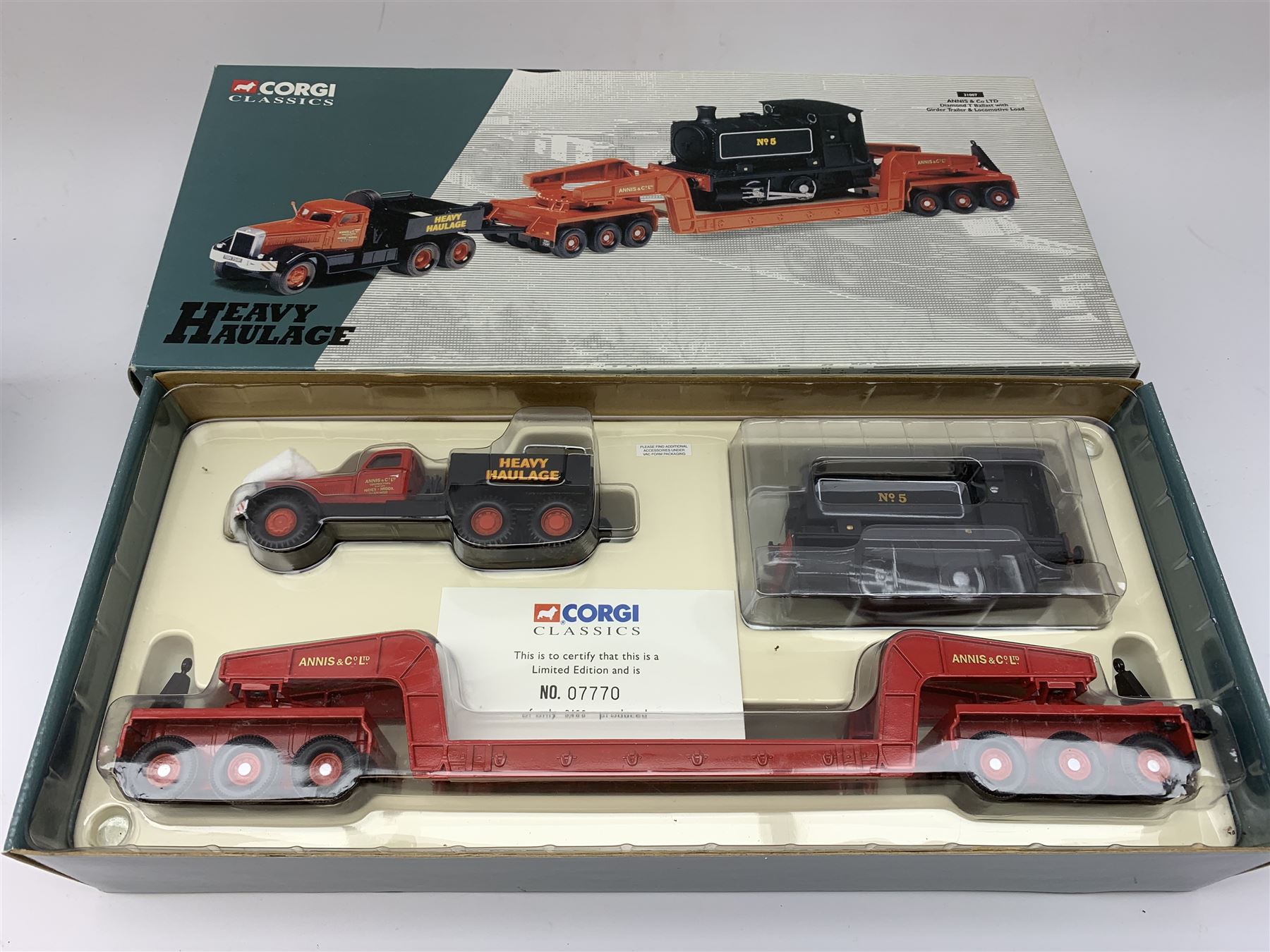 Three Corgi limited edition commercial vehicles - 31007 Heavy Haulage Annis & Co Ltd Diamond T Ballast with Girder Trailer & Locomotive Load No.07770/9400; 17904 Pickfords 2 Scammell Contractors No.3852/5000; and 97892 S. Houseman A.E.C. Mercury Truck & Trailer; all mint and boxed with certificates (3)