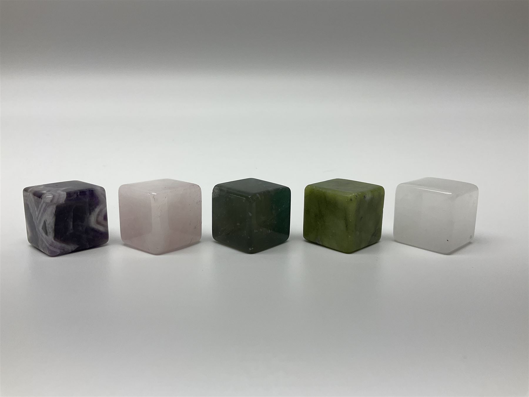 Fifteen cube mineral specimens, each cut and polished to highlight natural formations, including tiger eye, black obsidian, green aventurine, rose quartz, opalite, rhodonite etc, H2cm 