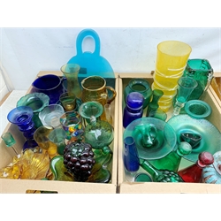 A large collection of glassware, comprising mostly amber glass, and some green and blue glass, to include various vases, bowls, drinking glasses, etc. 
