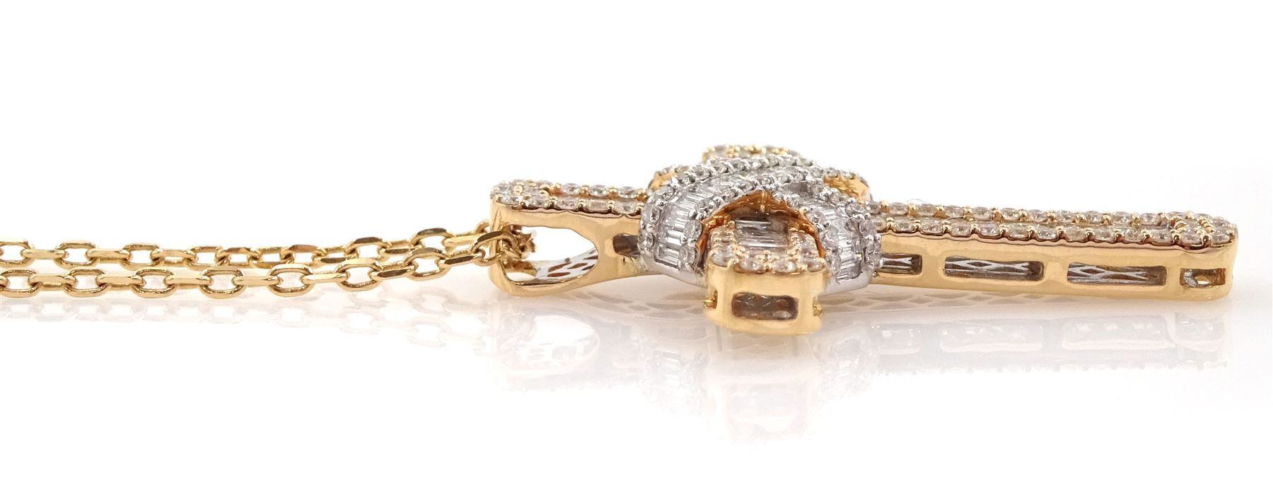 18ct gold baguette and round brilliant cut diamond cross pendant necklace, total diamond weight approx 1.50 carat