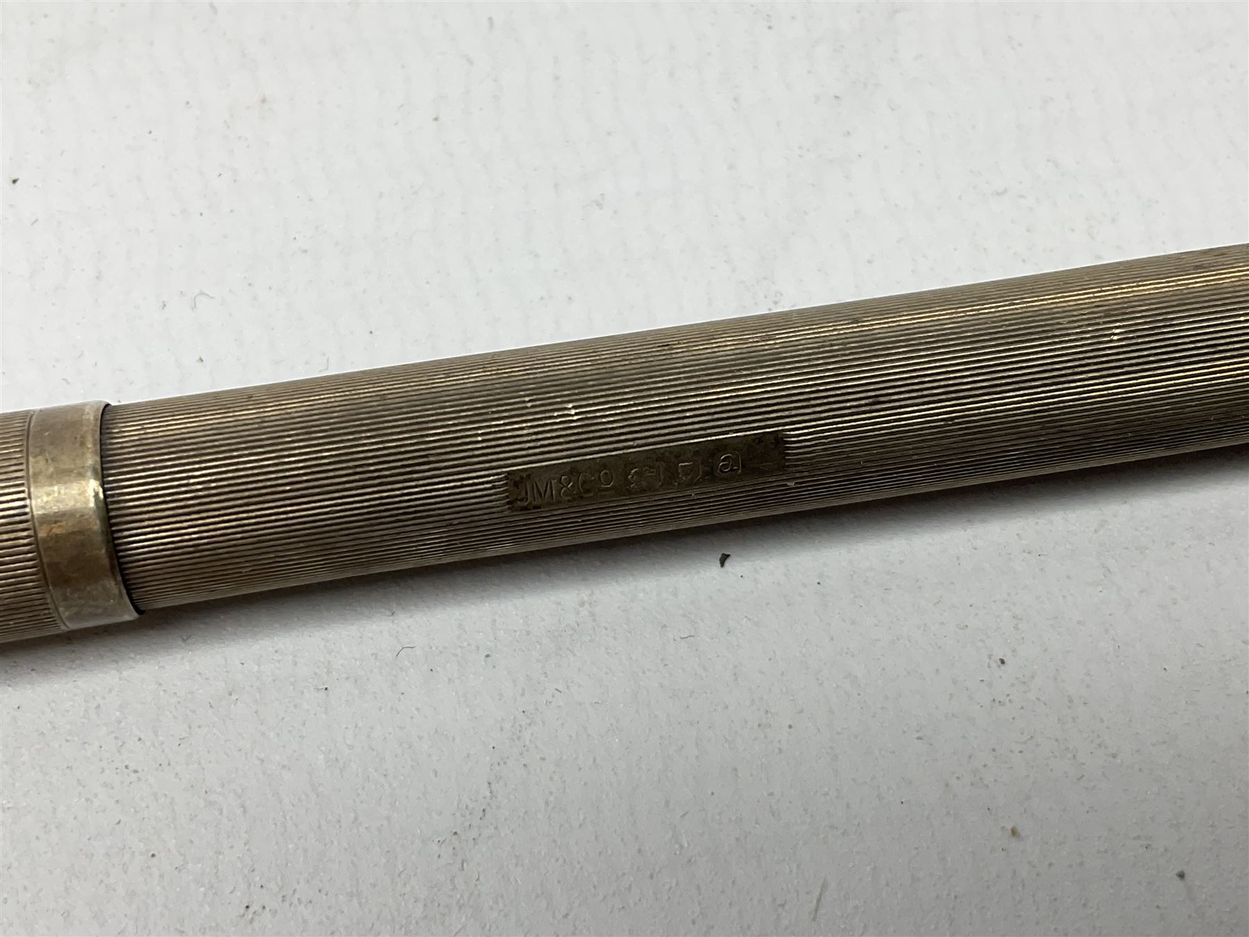 20th century engine turned silver propelling pencil by Johnson, Matthey & Co, stamped London 1956, together with silver cigarette case stamped Birmingham 1904 with engraved foliate decoration, total weight 74g