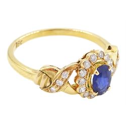 18ct gold sapphire and diamond cluster ring, single oval cut sapphire of approx 0.50 carat, surrounded by fourteen round brilliant cut diamonds, with pierced crossover diamond set shoulders, stamped, total diamond weight approx 0.20 carat