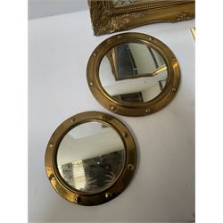 Ornate gilt rectangular wall mirror, two circular convex mirrors and a floral mirror