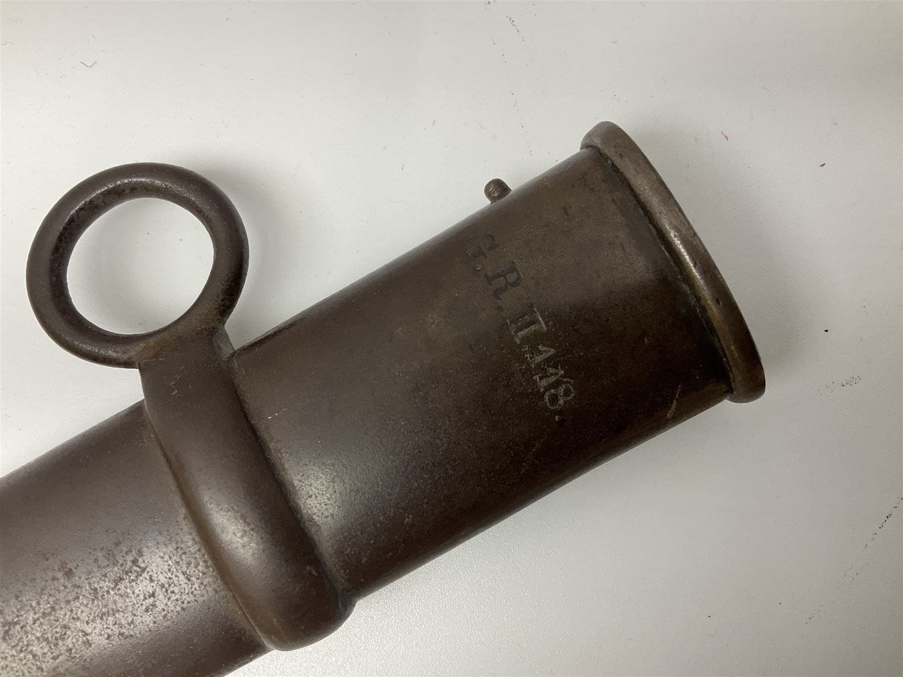 19th Century German (Saxony) Cavalry Sword, the 90.5cm single edge curved steel blade with narrow fuller to the back edge at each side, engraved with a crowned AR monogram and coat of arms, stamped with crowned AR, the back edge engraved C.v Keller im Solingen 1862, the brass half basket hilt with three flat curved bars, applied badge missing, marked G.R. 4, with ribbed leather covered grip and leather finger strap; in steel scabbard with two fixed suspension rings to one side and stamped G.R. II 118; L109.5cm overall