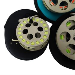 Five Lamson Litespeed fly reels, comprising LS4, two LS2, two LS3.5, all within Lamson soft pouches