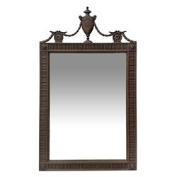 20th century Adams style mahogany wall mirror, urn pediment with husk swags and flower head roundels, fluted surround with foliate moulded slip, each corner set with floral rondel