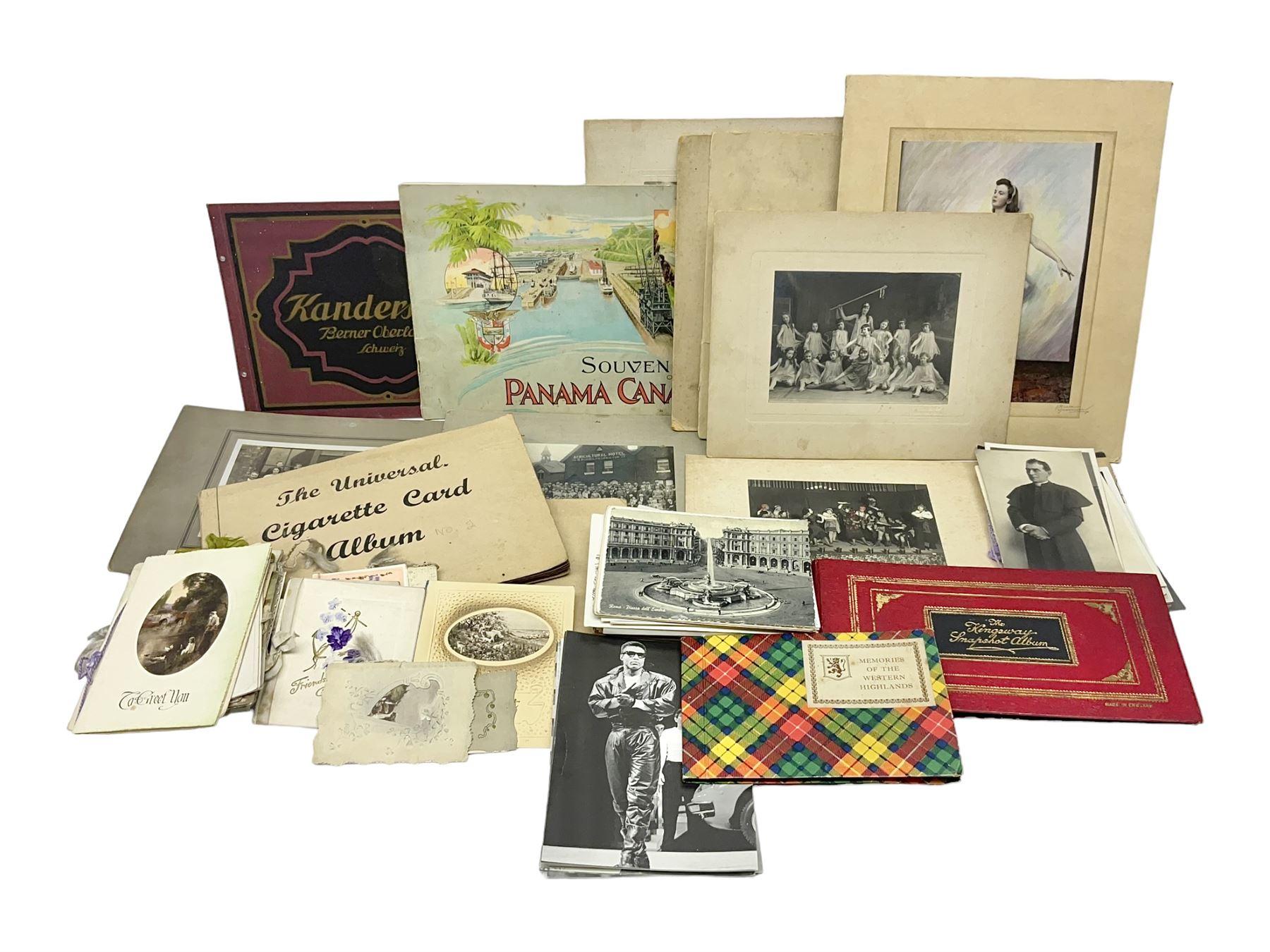 Two albums of cigarette cards, including Carreras Alice in Wonderland examples, together with vintage greetings cards, postcards, theatre stills, etc