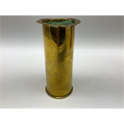 First World War Trench Art shell cases, to include pair engraved France with foliate design and frilled splaying rim, another larger plain shell case all marked 1916, WWII Kynoch Works capped case, and further shell case and bullet