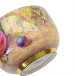 20th century Royal Worcester footed bowl, hand painted with gilt interior, the exterior a still life of fruit upon a mossy ground, signed Freeman, with black printed mark beneath, together with plate side plate and cabinet plate, bowl, H8cm, D13cm