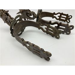 Pair of South American gaucho steel and brass spurs with eight-spike heel rowels, possibly Chilean L25cm